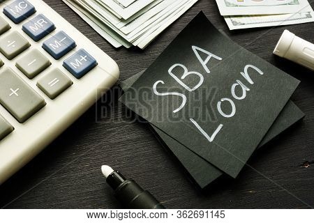 Sba Loan Handwritten Memo On The Calculator.