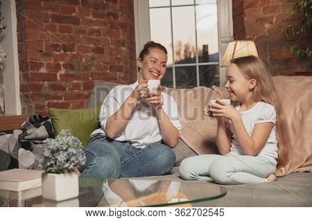 Tea Drinking, Talking. Mother And Daughter During Self-insulation At Home While Quarantined, Family 