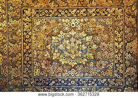 Metal Bronze Surface With Floral Ornament With Many Elements And And Mother-of-pearl Incrustation