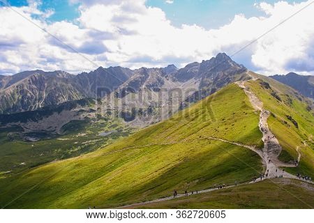 Mountain Panorama View On The Top Of A Kasprowy Wierch Mount In Tatry, Poland. Mountain Ragne Landsc