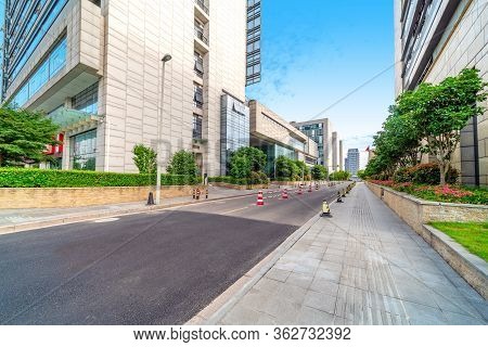 Empty Road And Tall Buildings In The Financial District, Ningbo, China.