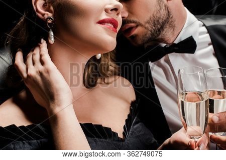 Cropped View Of Elegant Man Near Sensual Woman Touching Neck Isolated On Black