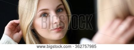 Happy Girl Looks In Mirror Her Eyebrows And Face. Color Gradient At Eyebrow From Light To Dark. Gent