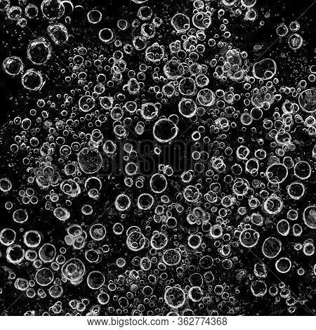 Beautiful Close-up on air bubbles stuck in frozen water
