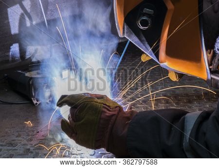 Welders Working At The Plant Produce Metal Structures