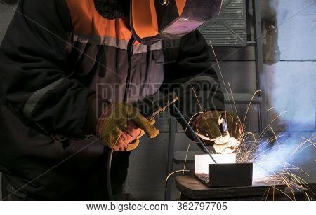 Welders Working At The Plant Produce Metal Structures