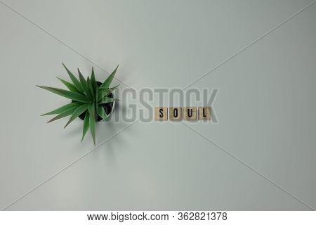 The Word Soul Written In Wooden Letter Tiles On A White Background.  Concept Spiritual, Peace, Relig