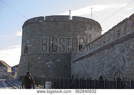 Photograph Of Kilitbahir Castle Walking On The Road. Photo Was Taken In Sunny Weather.