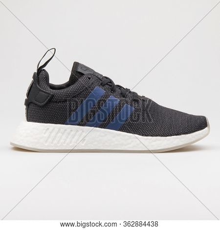 Vienna, Austria - January 12, 2018: Adidas Nmd R2 Black And Blue Sneaker On White Background.