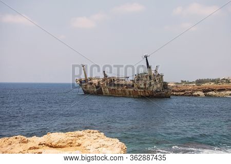 Paphos. Shipwreck. The Ship Crashed On The Coastal Rocks At The Shore Of The Mediterranean Sea. Tour