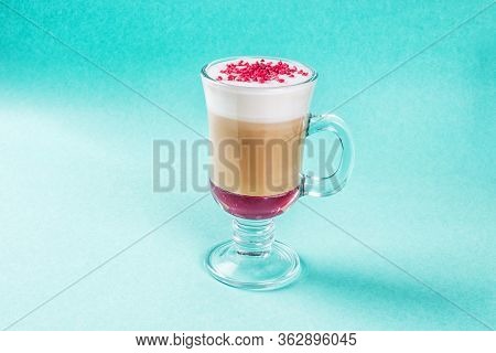 Coffee Raff With Raspberries In A Glass Cup With A Handle. Close-up Shot
