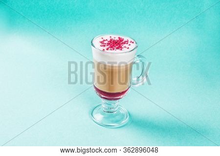 Coffee Raff With Raspberries In A Glass Cup With A Handle. Close-up Shot