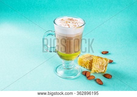 Coffee Raff With The Addition Of Honey In A Glass Cup. Close-up Shot
