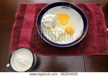 Flour In Cup, Cottage Cheese In A Bowl, Eggs, Saha And Butter, Cooking Delicious Pie At Home, Easter
