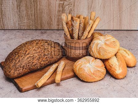Сrisp Bread With Buns. French Baguettes. Fresh Crispbread. Bread Background. Different Breed  On Woo