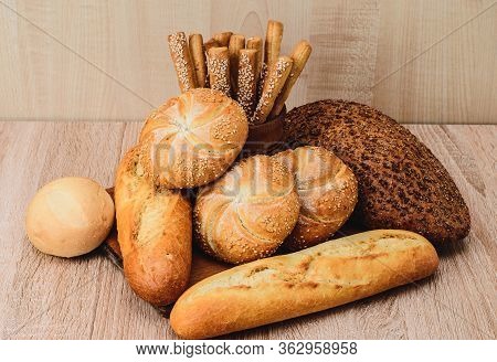 Сrisp Bread With Buns. French Baguettes. Fresh Crispbread. Bread Background. Different Breed  On Woo