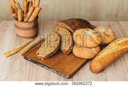 Сrisp Bread With Buns. French Baguettes. Fresh Crispbread. Bread Background. Different Breed  On Woo