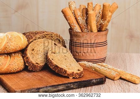 Сrisp Bread With Buns. French Baguettes. Fresh Crispbread. Bread Background. Different Breed  On Woo
