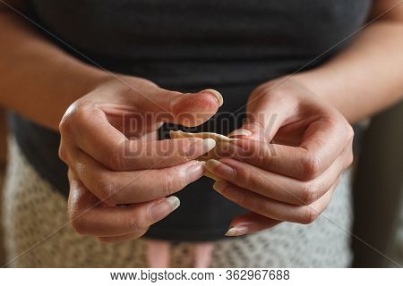 Cooking Homemade Dumplings, Female Hands Sculpting Dumpling Closeup