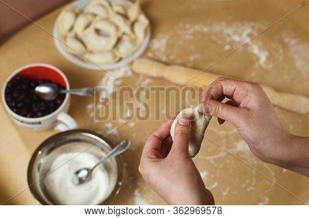 Cooking Homemade Dumplings With Blueberry, Female Hands Sculpting Dumpling Closeup
