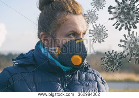 Woman wearing a real anti-pollution and anti-viruses face mask outside. SARS COVID-19 pandemic concept