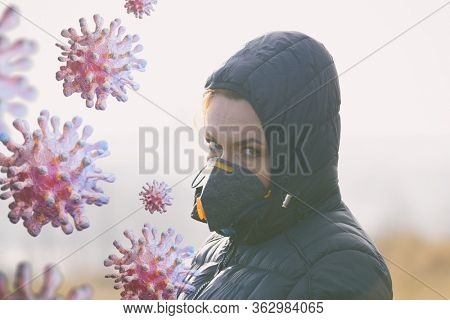 Woman wearing a real anti-pollution and anti-viruses face mask outside. SARS COVID-19 pandemic concept