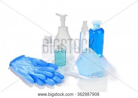 Protective surgical mask, gloves and hand sanitizers to protect from pandemic Coronavirus or COVID-19. 