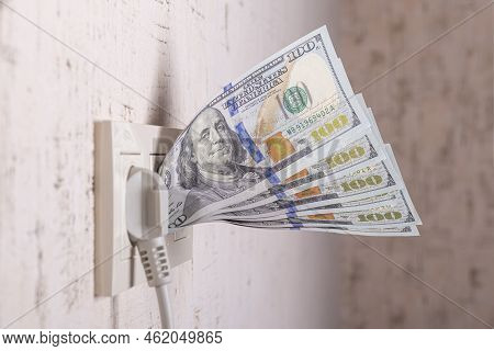Socket And Switch In The Wall. 100 Is In It. Tariff Growth. Saving Electricity