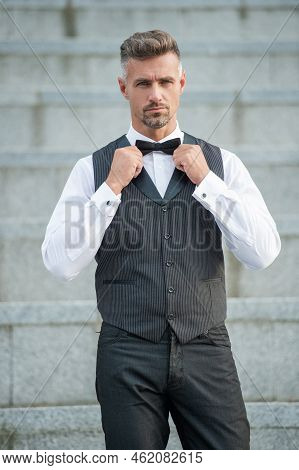 Mature Elegant Man In Bowtie. Grizzled Man In Formalwear. Tux Man Bridegroom