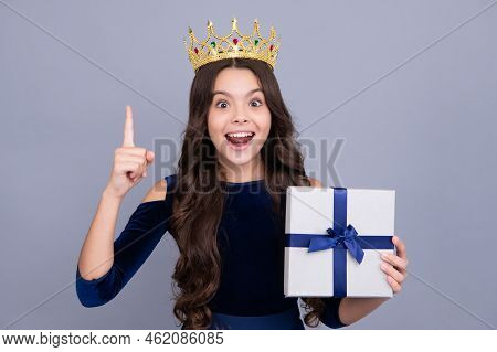 Excited Teenager Girl Princess In Crown. Teenager Kid With Present Box. Teen Girl Giving Birthday Gi