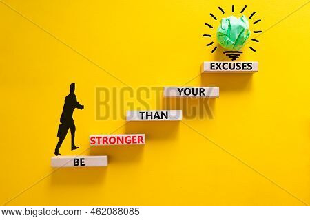 Be Stronger Symbol. Concept Words Be Stronger Than Your Excuses On Wooden Blocks On A Beautiful Yell
