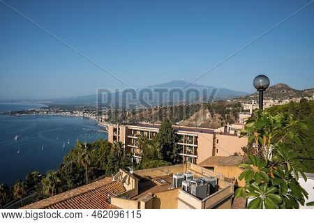Beautiful Scenery Of Hotel Elios And Etna Volcano By Sea With Sky In Background