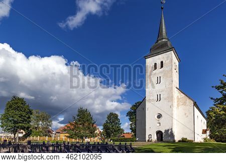 St. Johns Lutheran Church Or Jaanikirik With An Old Wooden Bridge Across The Canal At Nice Summer Da