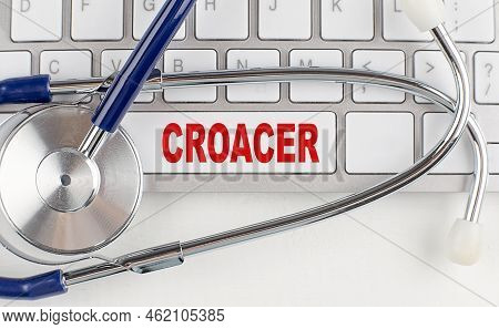 Croaker Text On A Keyboard With Stethoscope , Medical Concept