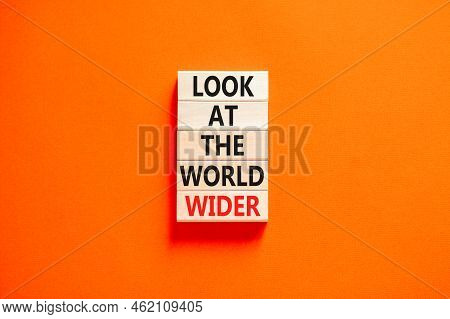 Look At The World Wider Symbol. Concept Words Look At The World Wider On Wooden Blocks On A Beautifu