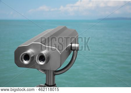 Metal Tower Viewer Installed Near Sea. Mounted Binoculars