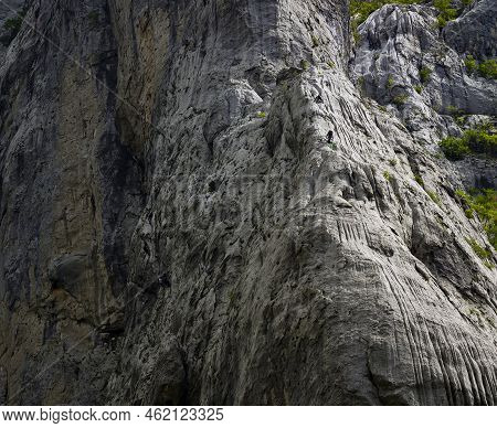 Paklenica, Croatia, Eu - June 25, 2022: Distant View Of Mountain Climbers In National Park Paklenica