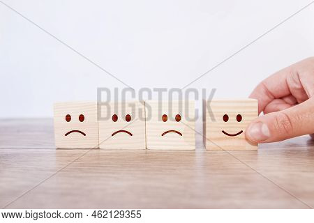 Hand Pick Wooden Cube With Smile On Face Icon, Customer Experience, Best Business Service Rating, Sa
