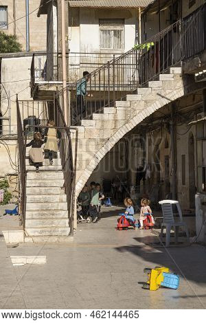 Jerusalem, Israel - July 7th, 2022: Jewish Orthodox Children Playing In Their Community's Closed Yar