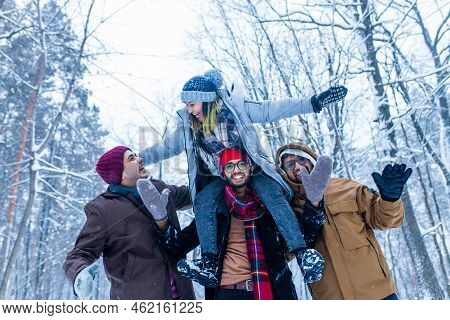 Outdoor Lifestyle Portrait Of Four Best Friends, Smiling And Having Fun Together