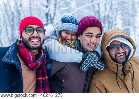 Outdoor Lifestyle Portrait Of Four Best Friends, Smiling And Having Fun Together