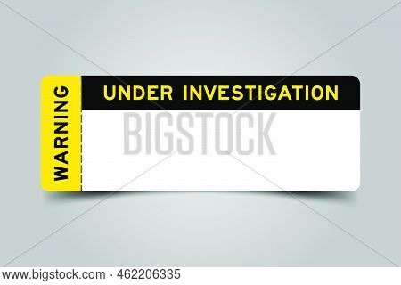 Yellow And Black Color Ticket With Word Warning And Under Investigation And Have White Copy Psace On