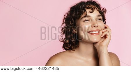 Skin Care. Woman With Beauty Face Touching Healthy Facial Skin Portrait. Beautiful Smiling Girl Mode