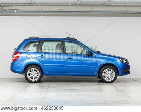 Novosibirsk, Russia - September 02 , 2022: Blue  Lada Granta,  White Lada Granta, Side View. Popular