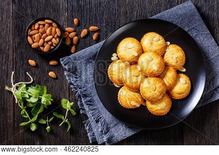 Dutch Almond Cookies Filled With Marzipan And Almonds Nuts Paste, Gevulde Koek, On Black Plate On Da