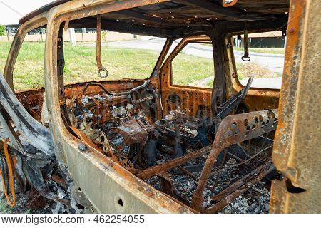 Damaged And Destroyed Civilian Car With Shrapnel Holes From Russian Missile In A War Zone In Kharkiv