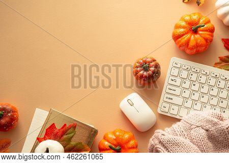 Autumn Office Workspace. Keyboard, Laptop, Notebok With Autumn Clothes And Fall Decorations - Pumpki