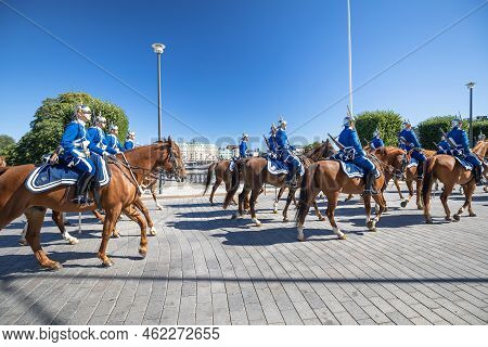 Stockholm, Sweden, August 26 2022: Swedish Royal Mounted Guards Cavalry Marching Through Stockholm S