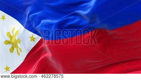 Close-up View Of The Philippines National Flag Waving In The Wind. The Republic Of The Philippines I