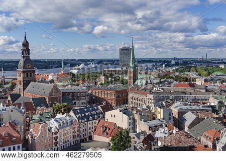 Latvia, Riga, September, 2022: Aerial View From Saint Peters Church On Riga Old Town And Large Cruis